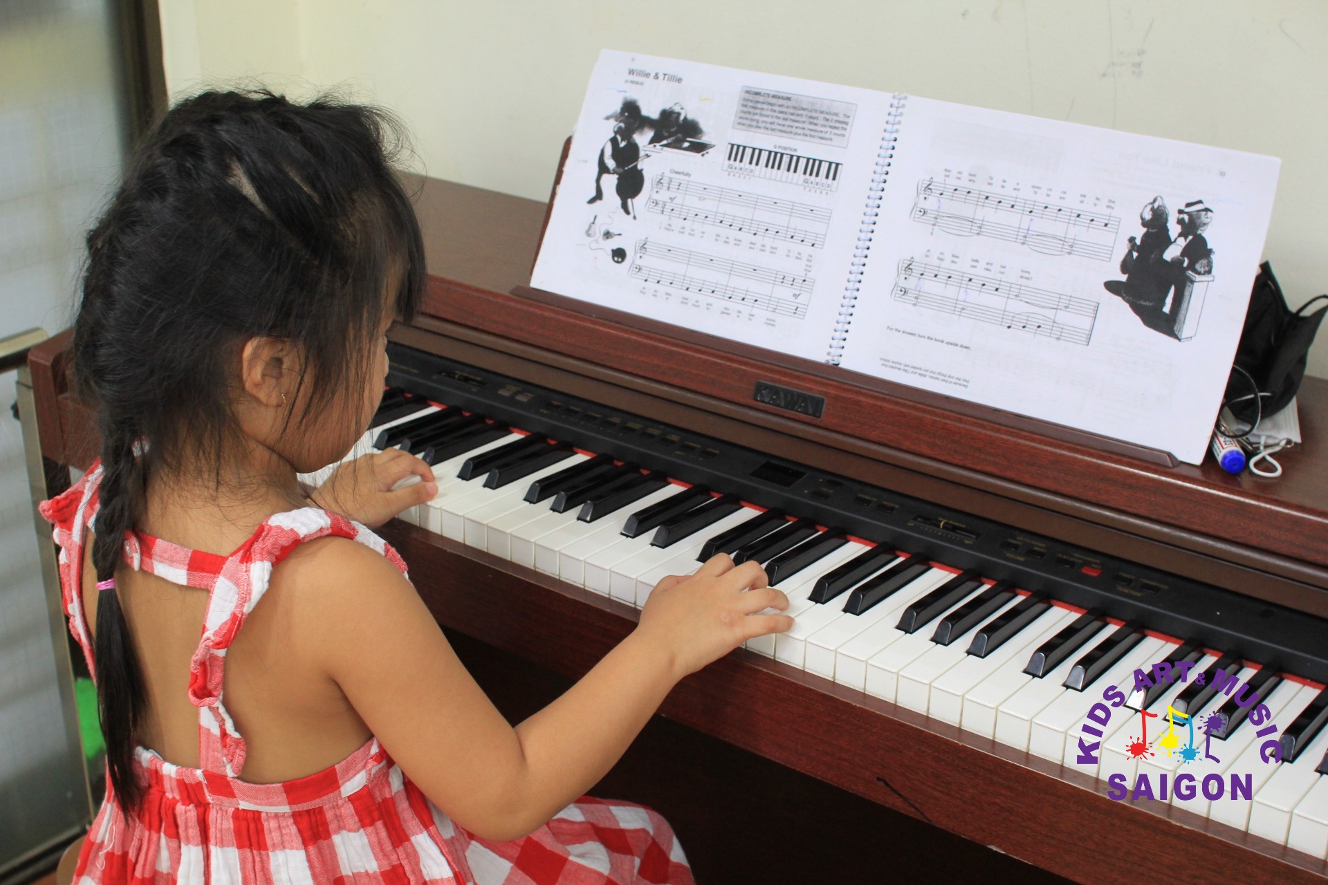 Chọn mua đàn Piano cho bé